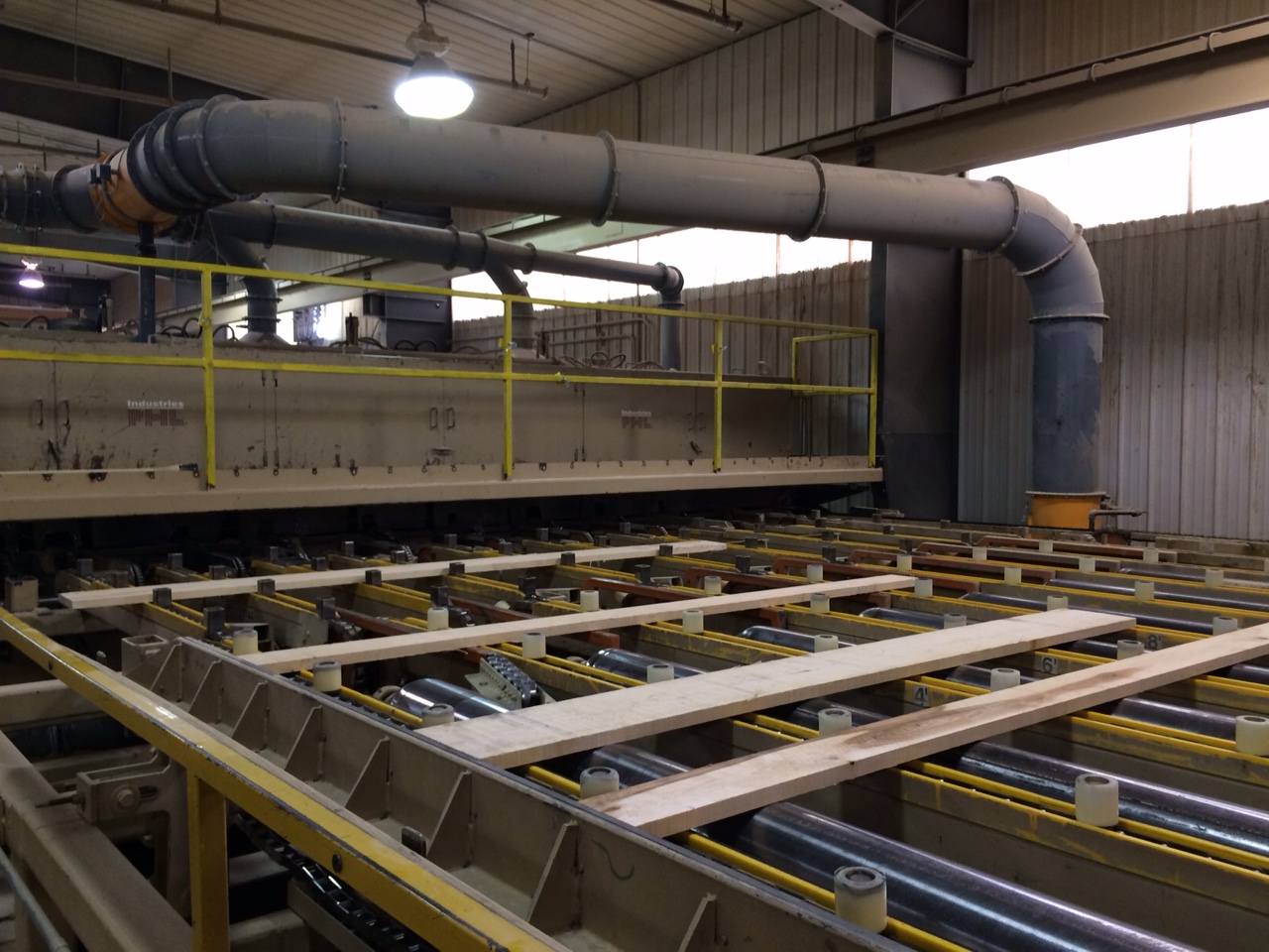 Finished lumber going to sorting bins Maine Woods Company